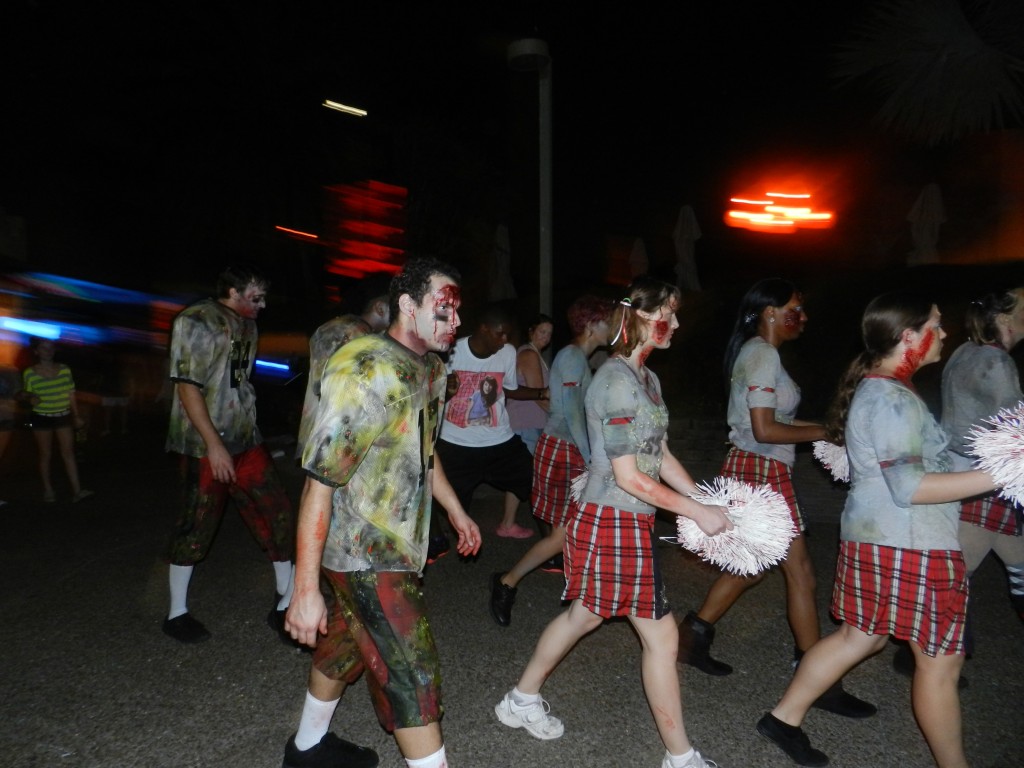 Howl-O-Scream Busch Gardens Tampa Bay Zombie Football team and cheerleaders roaming the streets. Keep reading for more Busch Gardens Howl O Scream tips and survival guide.