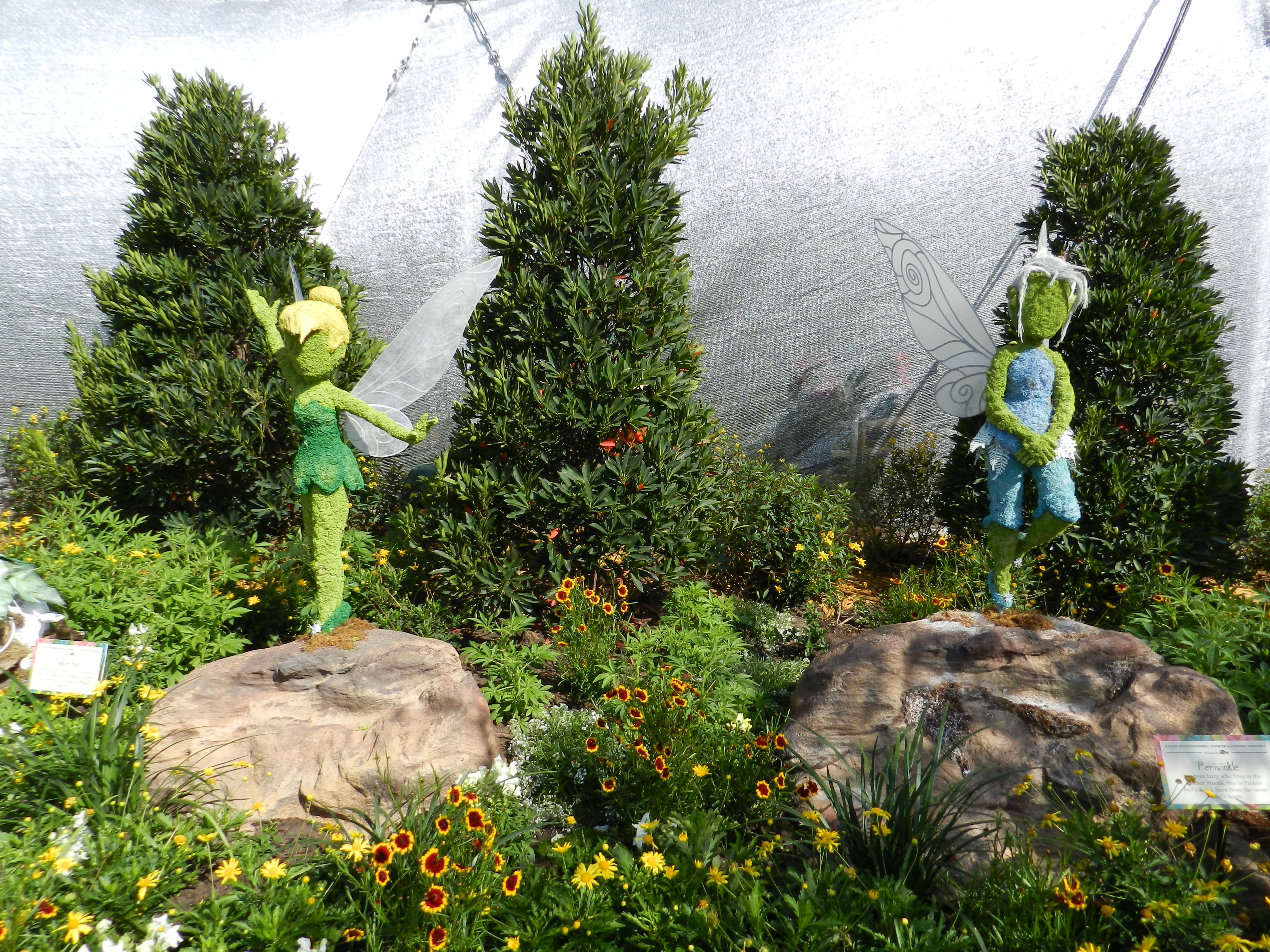 Tinkerbell and Periwinkle Fairy Topiary. Epcot Flower and Garden Festival one-day itinerary with colorful topiary. Keep reading to see the best epcot flower and garden topiaries through the years!