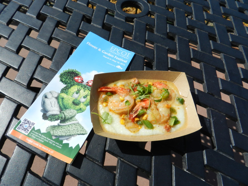 EPCOT Flower Garden Festival 2013 menu and food.  Shrimp and Stone Ground Grits with Andouille Sausage, Sweet Corn, Tomatoes and Cilantro. Photo Copyright ThemeParkHipster.
