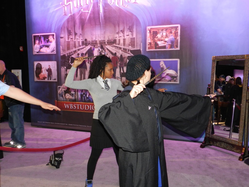 A Harry Potter Celebration Wand Combat with ravenclaw wizards NikkyJ as NikkyJ is dressed in themed character bonding clothing. Keep reading to discover what to pack for Universal Studios Florida.