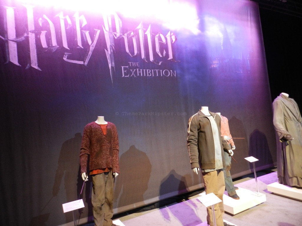 Harry Potter film costume exhibition with a dirty Hermonie and Harry Potter clothing from Deathly Hallows. Harry Potter Celebration.