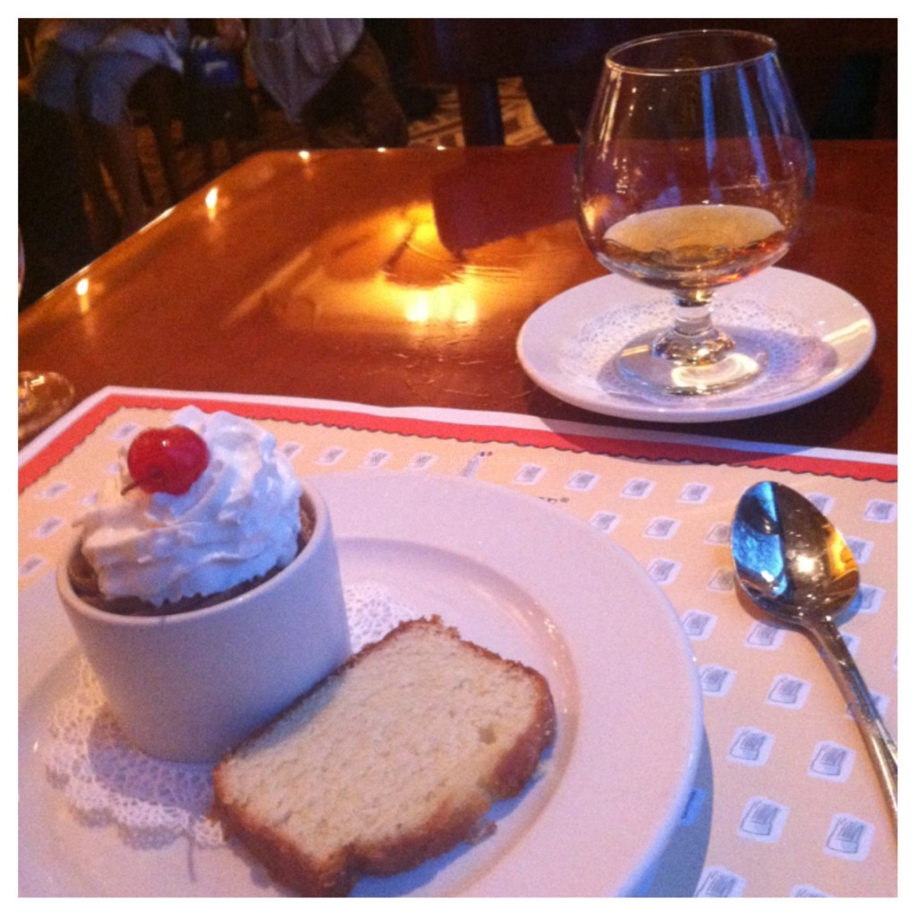 Chocolate Mousse topped with Whipped Cream and a glass of Grand Marnier at Chef de France in Disney's Epcot.