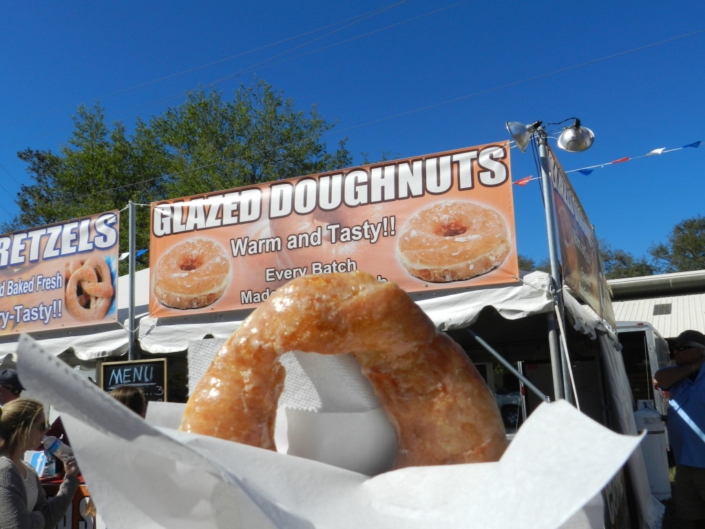 Delicious Glazed Doughnut at the Fair in Tampa. Keep reading to get the full 2024 Florida State Fair Guide with Tickets, Food, Concerts, Rides and More! Copyright ThemeParkHipster.