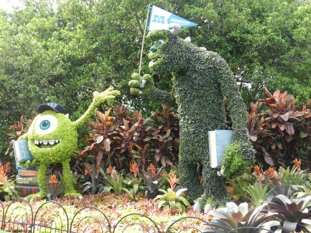 Monster's Inc Character topiaries at the Epcot Flower and Garden festival. Keep reading to get the best movies to watch for Disney World Magic Kingdom.