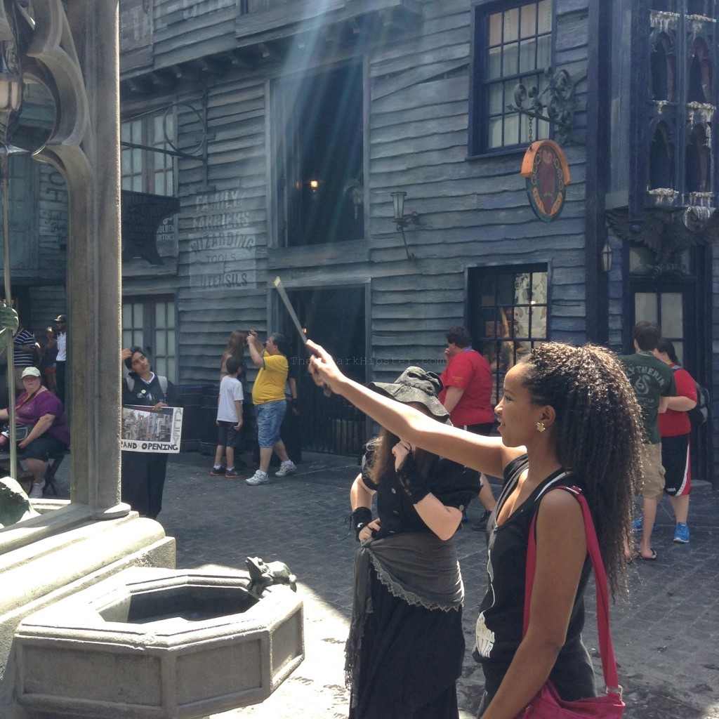 NikkyJ using Ollivanders Universal Studios Wand. Wizards World of Harry Potter Diagon Alley Theme Parks Alone. Keep reading to learn how to get chosen for a wand at Ollivanders Wand Shop in Universal at The Wizarding World of Harry Potter.