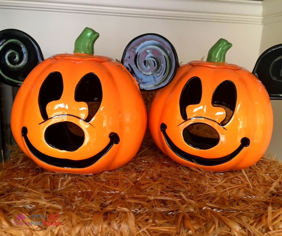 Disney Halloween Merchandise with Mickey Mouse Pumpkin Jack-O-Lantern Face Candle Holder. Keep reading for more Halloween at Disney things to do and events with fall decor.