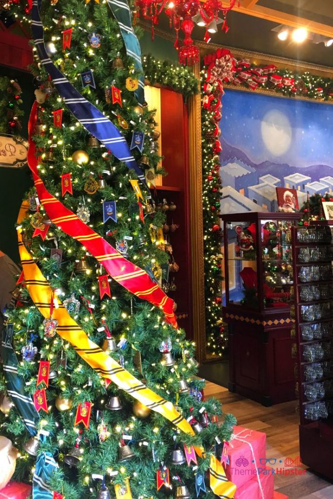 Hogwarts House Christmas Tree at Universal Orlando Holidays. Keep reading to get the full guide to Christmas at Universal Orlando Resort!