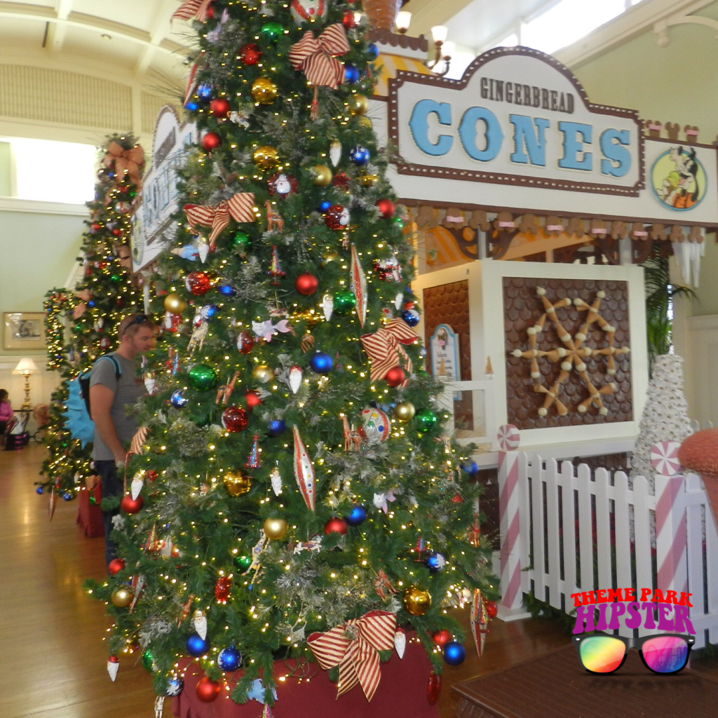 Christmas at Disney for Free. Christmas tree in Boardwalk Inn. Keep reading to learn about the Disney World Gingerbread house display on Theme Park Hipster!