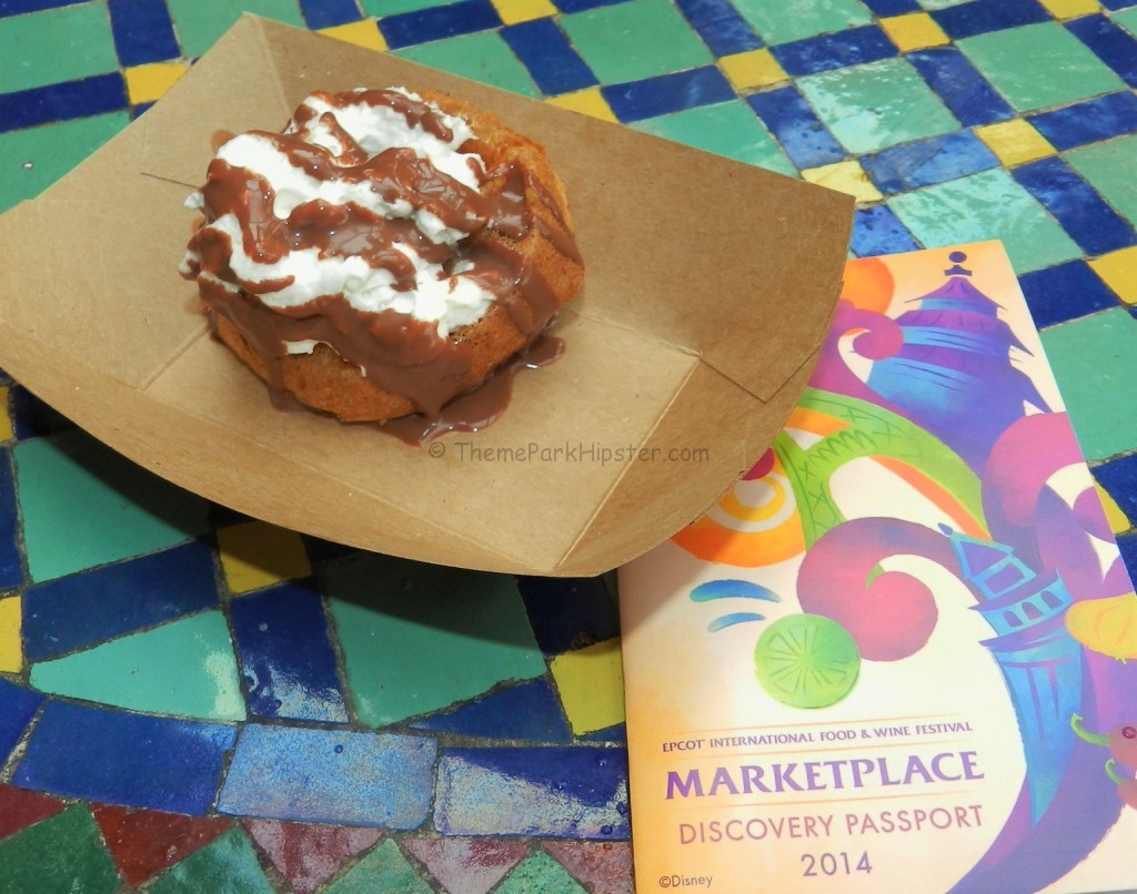 Epcot Food and Wine Festival menu with Belgium Waffle covered with chocolate and whip cream. Keep reading to learn more about the Epcot International Food and Wine Festival Menu.