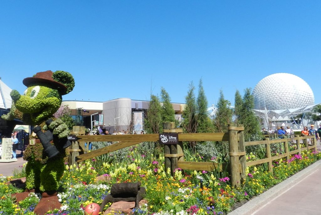 Disney Epcot International Flower and Garden Festival with topiary Mickey Mouse. Keep reading to see the best epcot flower and garden topiaries through the years!