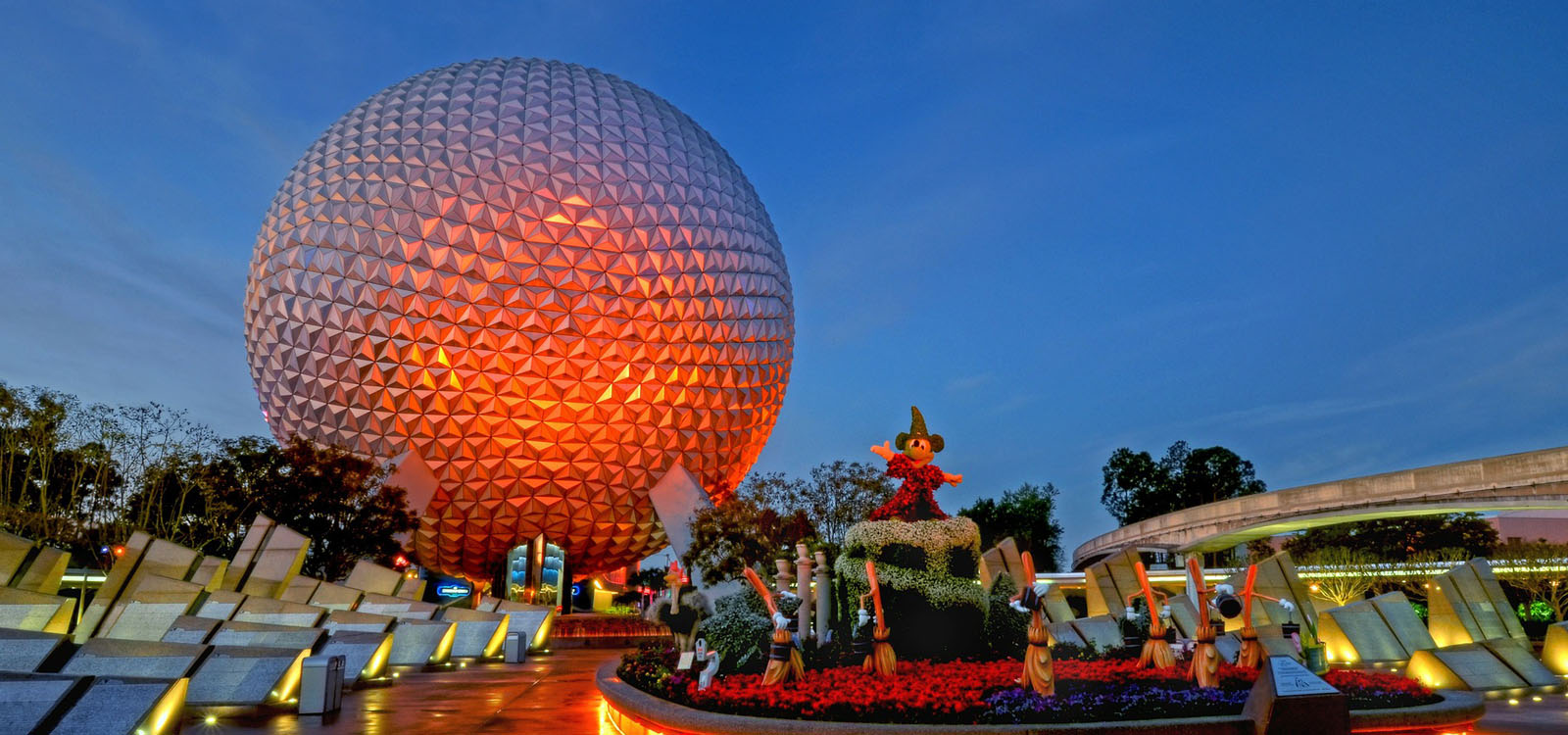 Epcot Hidden Secrets with Spaceship Earth in sunset colors. 