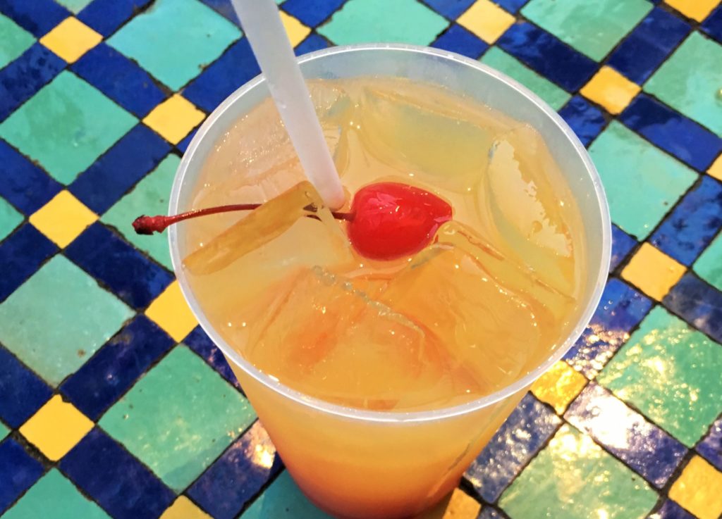 Mediterranean Journey Cocktail Drink at Epcot. Keep reading to get the best ways to beat the summer Florida heat. 