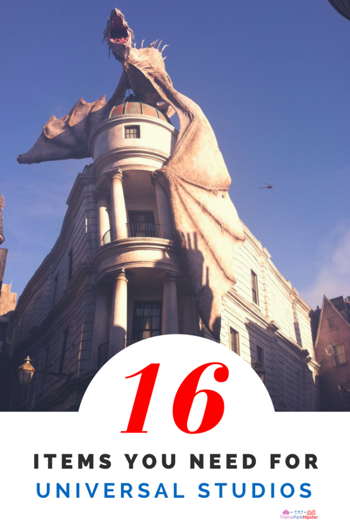 Ultimate Travel Guide for the best Universal Studios packing list with pale white dragon on top of Gringotts Bank in Diagon Alley.