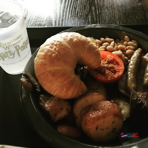 Three Broomsticks traditional British food at Islands of Adventure Hogsmeade. Keep reading to learn about the best Universal Orlando Resort restaurants for solo travelers.