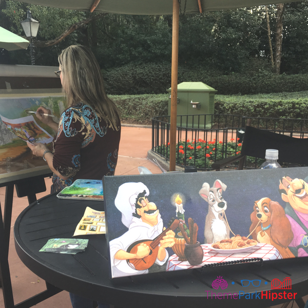 2024 Epcot Festival of the Arts Artists Painting on the World Showcase Pathway. Keep reading to get the fun and best things to do at Epcot Festival of the Arts!