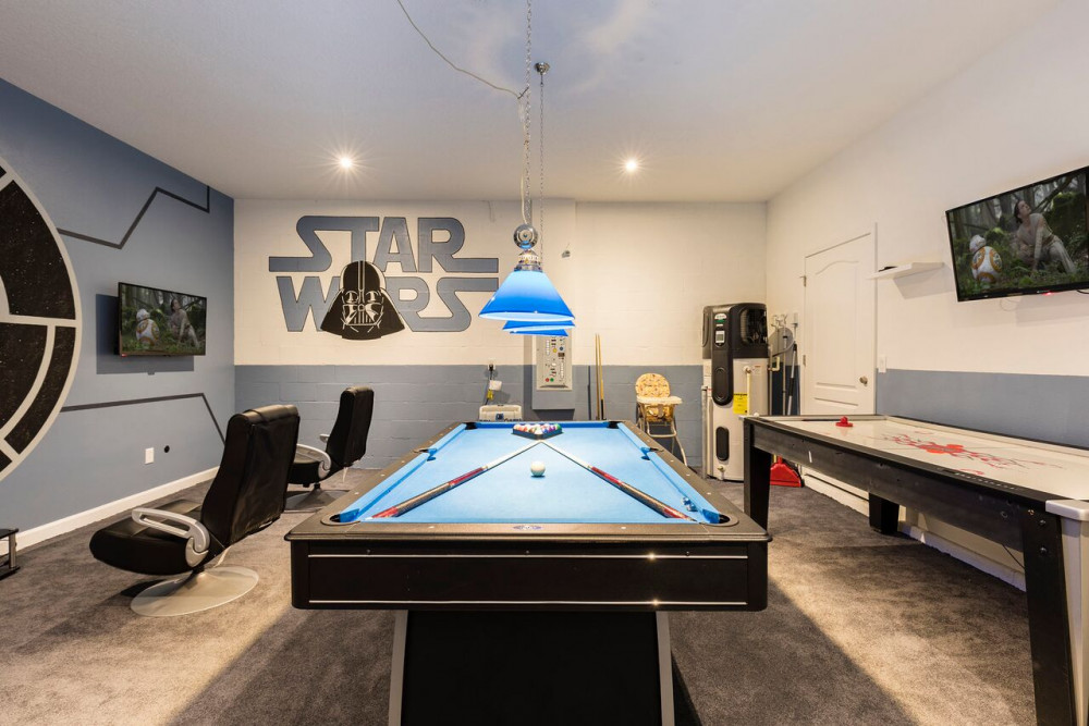 Champions Gate Orlando Vacation Home Resort. Star Wars themed room. Keep reading to learn about the best Orlando resorts with water parks.