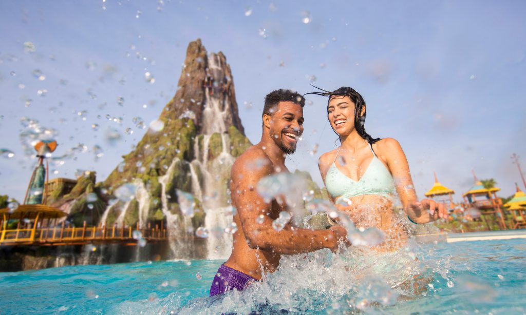 Things to do at Universal Orlando Couples splash in the water at Volcano Bay