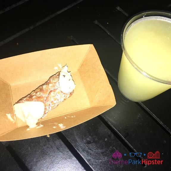 Italy cannoli and Italian margarita at Epcot Food and Wine Festival. Keep reading to learn more about the Epcot International Food and Wine Festival Menu.