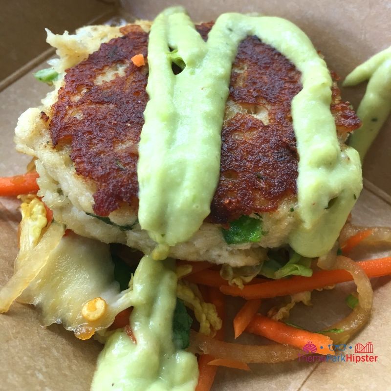 Lump Crab Cake with Napa Cabbage Slaw and Avocado-Lemongrass Cream Coastal Eats Epcot. Keep reading to get the best Epcot Food and Wine Festival Tips!