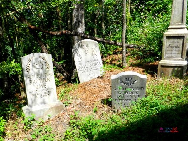 Haunted Mansion Tombstones have real names on them from Cast Members. A doctor and medical lawyer, Cary Sharp, donated $37,400 for a charity event held at Disneyland to become the "1000th" ghost! Keep reading for Disney World Haunted Mansion secrets and facts. 