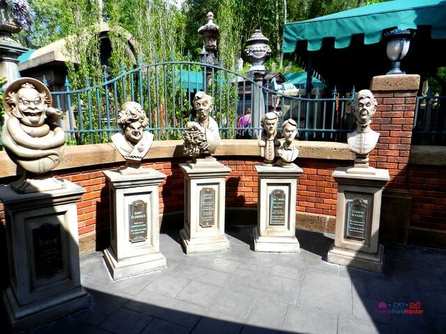Haunted Mansion Ghost Hosts in interactive line at Magic Kingdom. Keep reading for Disney World Haunted Mansion secrets and facts.