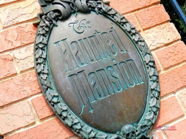Haunted Mansion Sign and Logo. Keep reading for Disney World Haunted Mansion secrets and facts.