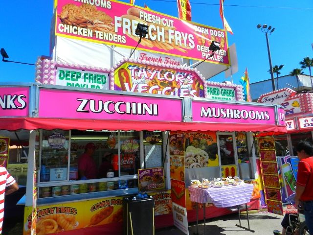 2024 Florida State Fair Food Deep Fried Kiosk with Fried Vegetables. Keep reading to get the full Florida State Fair Guide with Tickets, Food, Concerts, Rides and More!