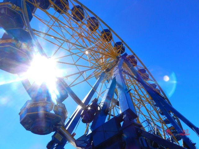 2024 Florida State Fair Giant Blue and Yellow Ferris Wheel. Keep reading to get the full Florida State Fair Guide with Tickets, Food, Concerts, Rides and More!