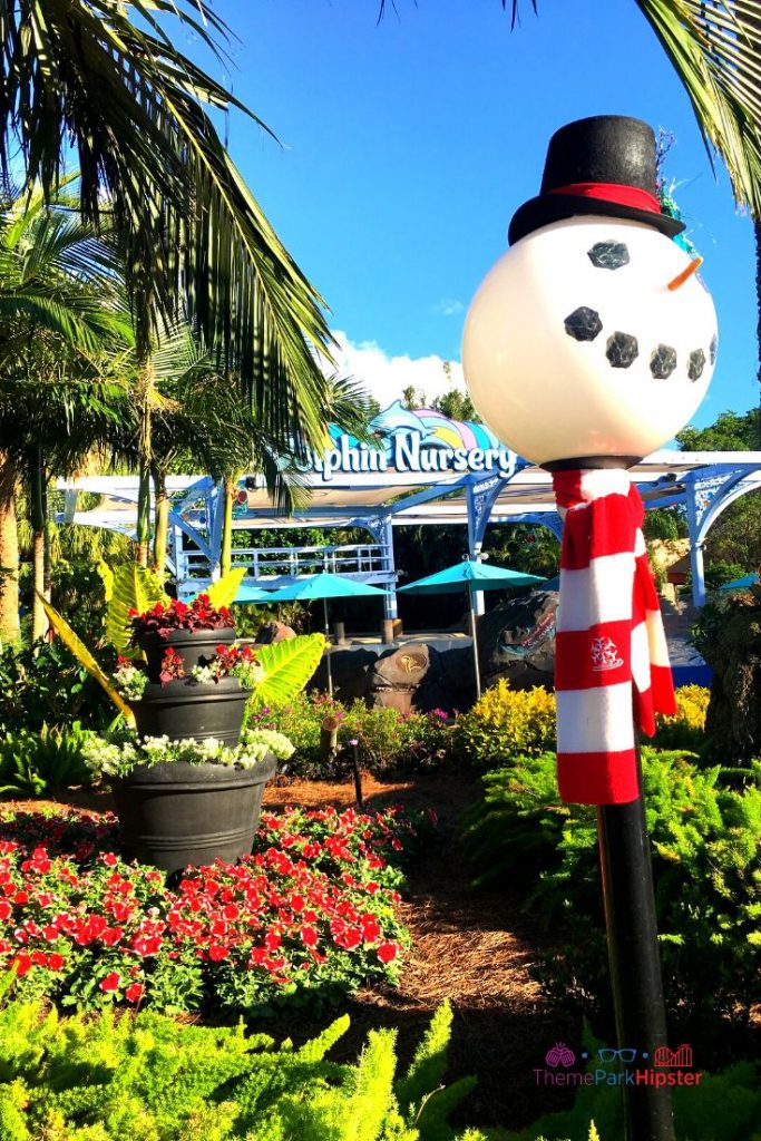 SeaWorld Christmas Celebration with Snowman Light Fixture. Keep reading to learn about Christmas at SeaWorld Orlando!