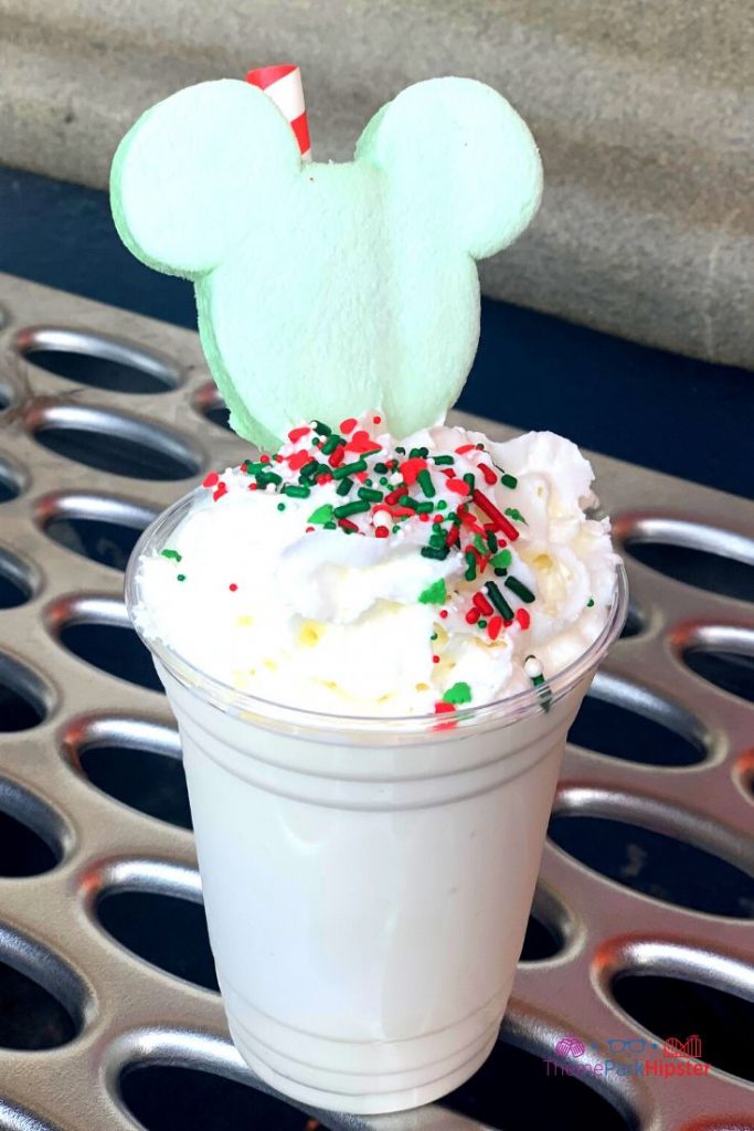 Mickeys Very Merry Christmas Party Sweet Treats Christmas at Disney Christmas Cookie Sundae (Available Daily at Auntie Gravity’s Galactic Goodies) – Cookie butter soft-serve topped with whipped cream, chocolate sauce, sprinkles, and a white chocolate piece