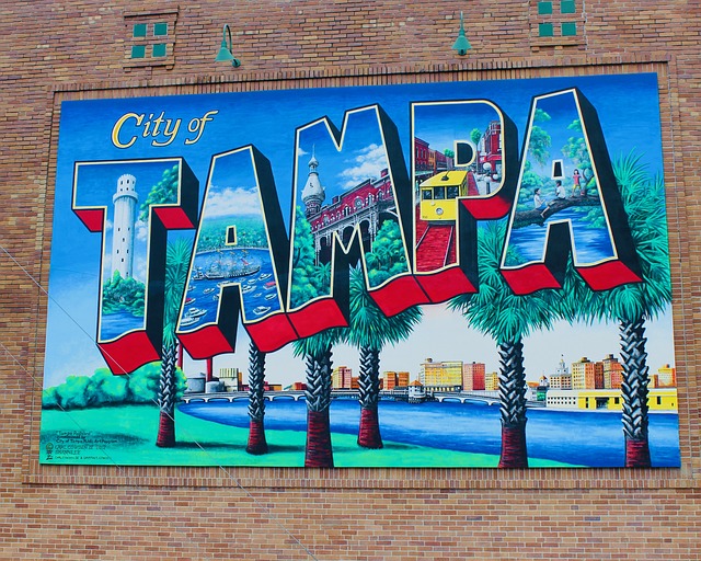 Tampa City Pass with classic welcome card painted on brick wall in Ybor City. Keep reading to get the best things to do in Tampa with CityPASS Tampa.