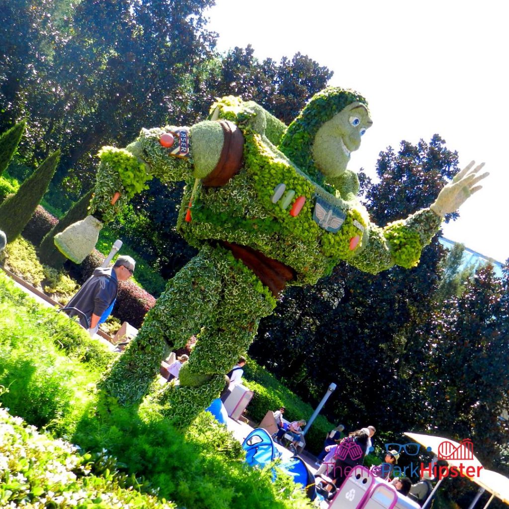 Epcot Flower and Garden Festival Buzz Lightyear Topiary. Keep reading to see the best epcot flower and garden topiaries through the years!