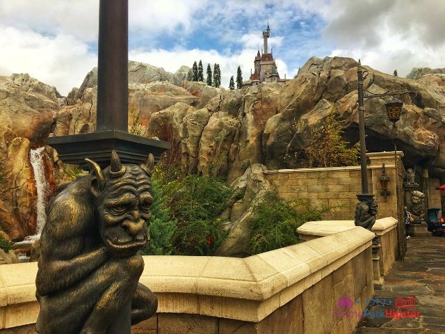 Be Our Guest Restaurant with gargoyle and castle. Keep reading to get the best movies to watch for Disney World Magic Kingdom.
