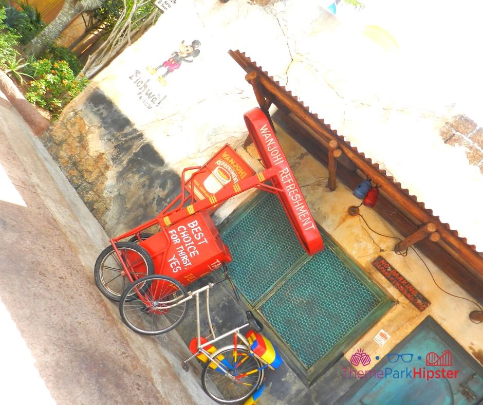 Animal Kingdom Harambe Village with Wanjohi Refreshment Red Bike