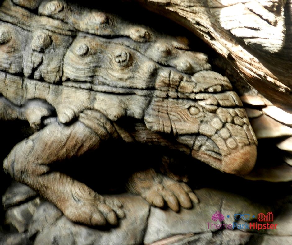 Animal Kingdom Tree of Life with Lizard Animal Carved inside of it