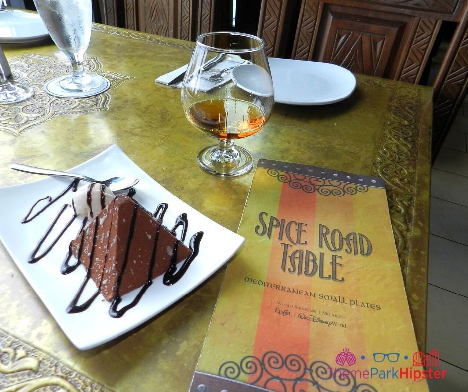Spice Road Table at Epcot Grand Mariner Cognac with Chocolate Pyramid Cake. One of the best places to stop on your epcot bar crawl.
