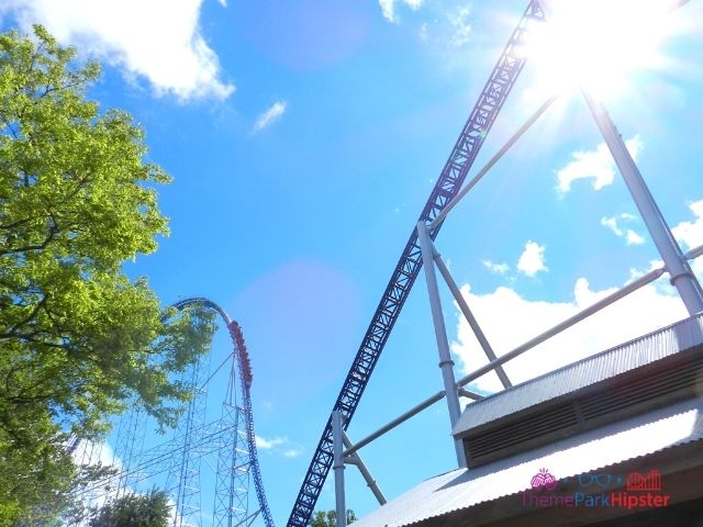 Millennium Force train going over the top drop with sun kiss at Cedar Point