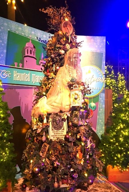 Disney Springs Christmas Tree Trail haunted mansion. Keep reading for more Disney Haunted Mansion Merchandise Gift Ideas.