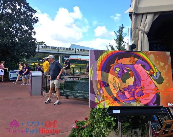 Figment Painting at Epcot Festival of the Arts. Keep reading to get the best Disney World souvenirs to buy for your trip!