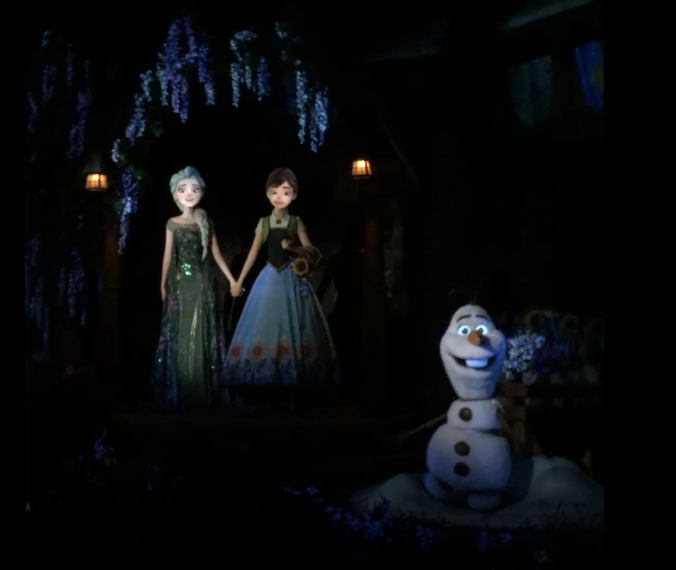 Frozen Ever After Ride at Epcot with Olaf, Ana and Elsa in their summer attire. Keep reading to get the best rides at EPCOT for Disney Genie Plus and Lightning Lane.