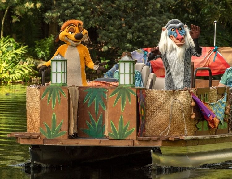 Timon (left) and Rafiki (right) sail down Discovery River as part of the holiday celebrations happening at Disney’s Animal Kingdom at Walt Disney World Resort in Lake Buena Vista, Fla. (Kent Phillips, photographer)