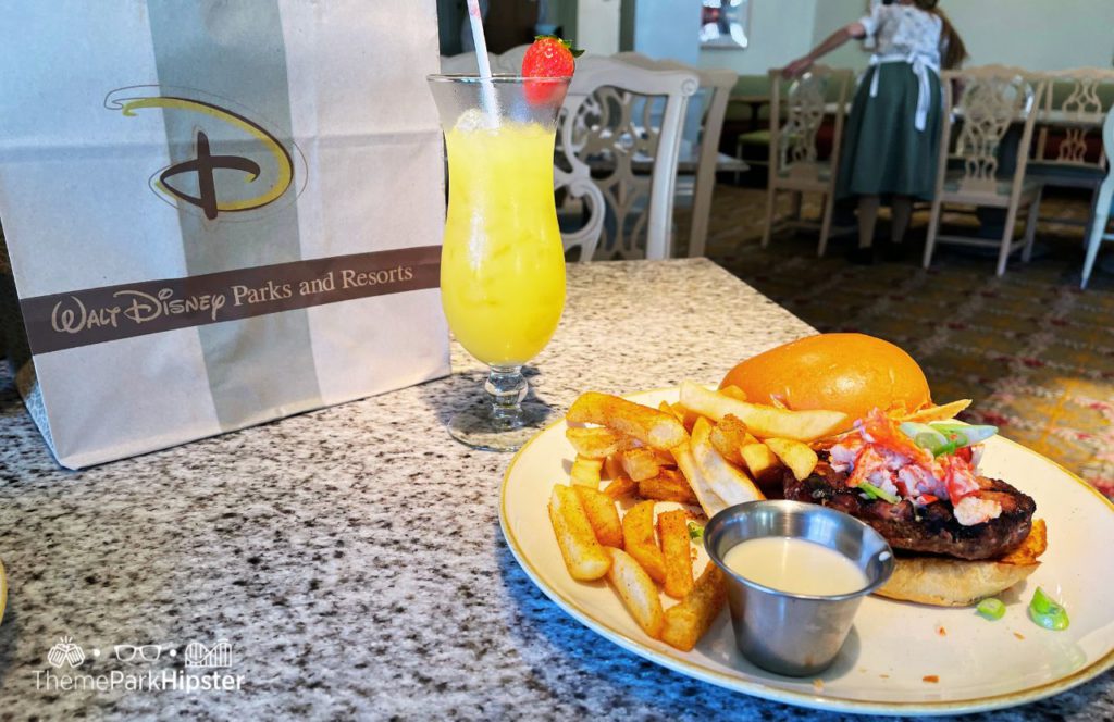Disney's Grand Floridian Cafe Restaurant Mimosa and Lobster Burger. One of the best places to get breakfast at Disney World.