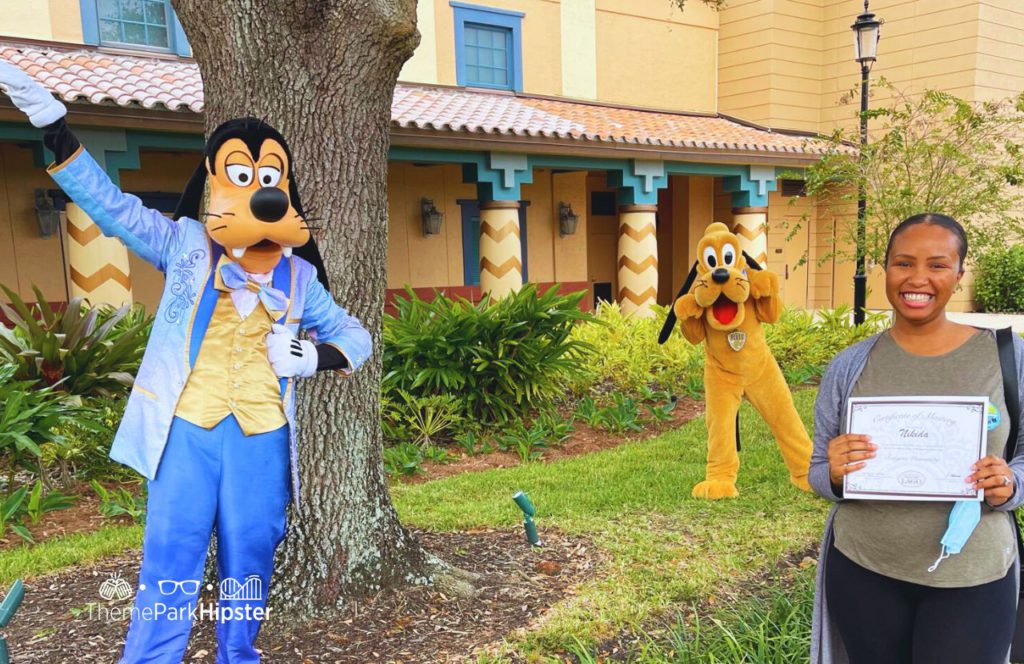 NikkyJ Goofy in 50th Anniversary Outfit and Pluto at Coronado Springs Resort. Keep reading to find out more about Disney world character meet and greets. 