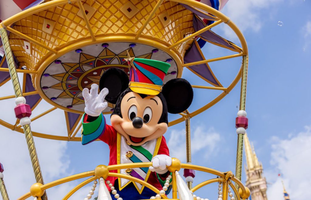 Mickey Mouse on Festival of Fantasy Parade at Magic Kingdom. Keep reading to learn about the best Magic Kingdom shows and why you'll want to stick around to watch a Magic Kingdom night show.