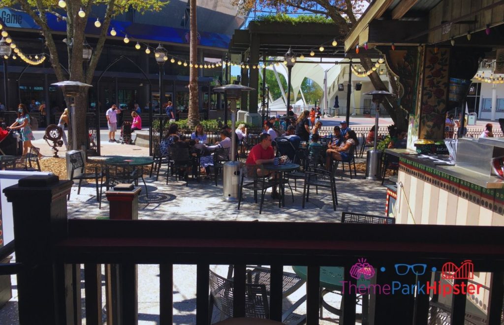 House of Blues Bar Area at Disney Springs with outdoor seating and hanging lights.  Keep reading to find out the most romantic things to do at Disney World.