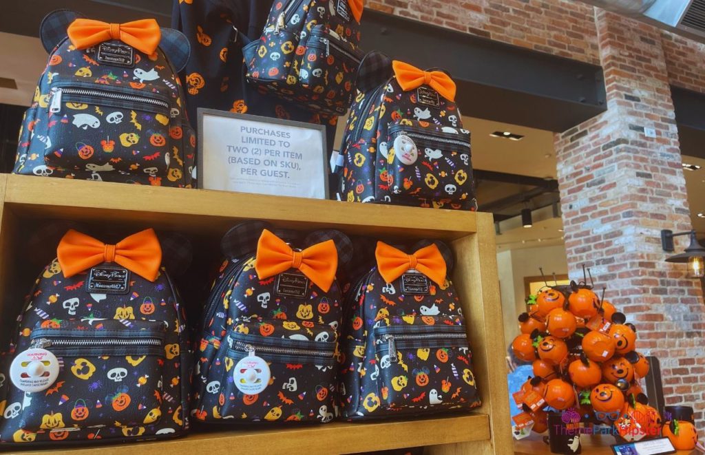 Disney Halloween Merchandise Loungefly Disney Bag. Keep reading to know what to wear to Disney World and what are the best clothes for Disney World.