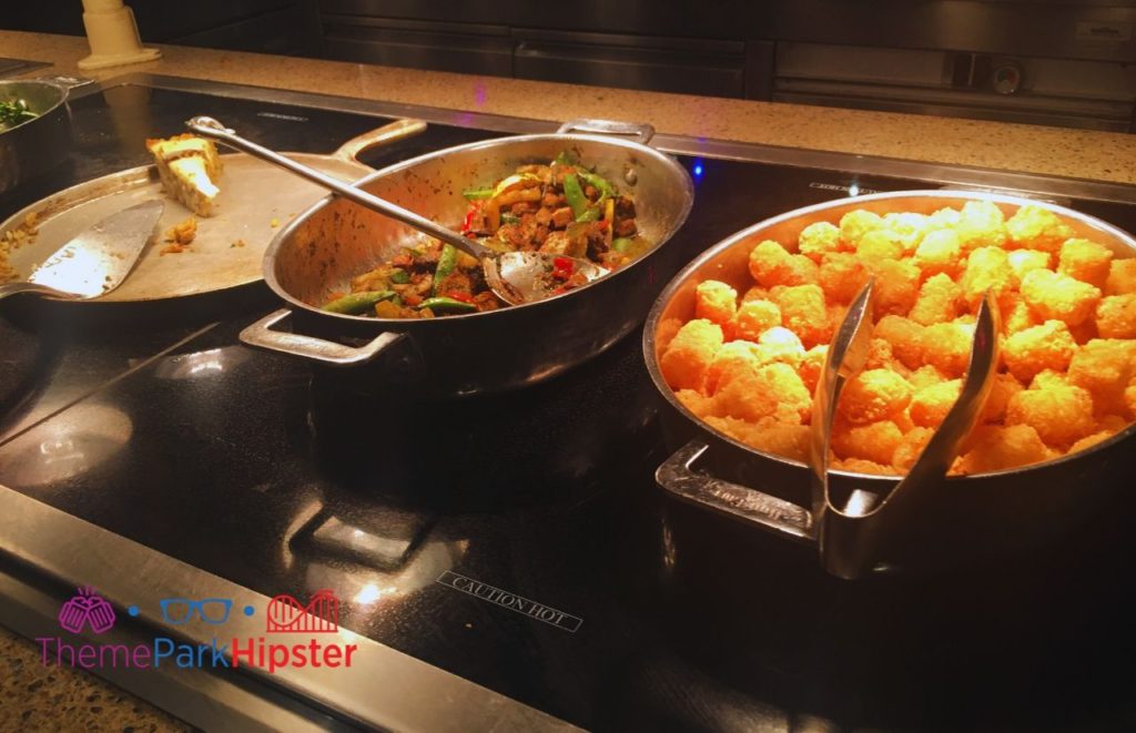 Disney Buffet Restaurant Cape May tater tots making it one of the Best Buffet in Disney World.