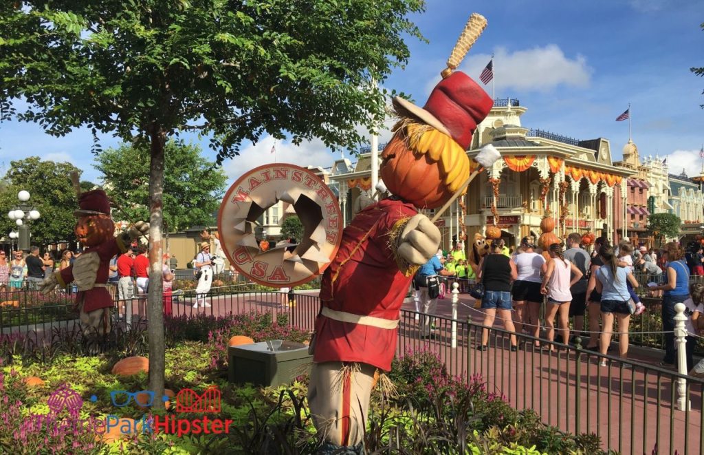 Fall Scarecrow at Magic Kingdom. Keep reading to learn about Magic Kingdom for adults the Disney grown up way.
