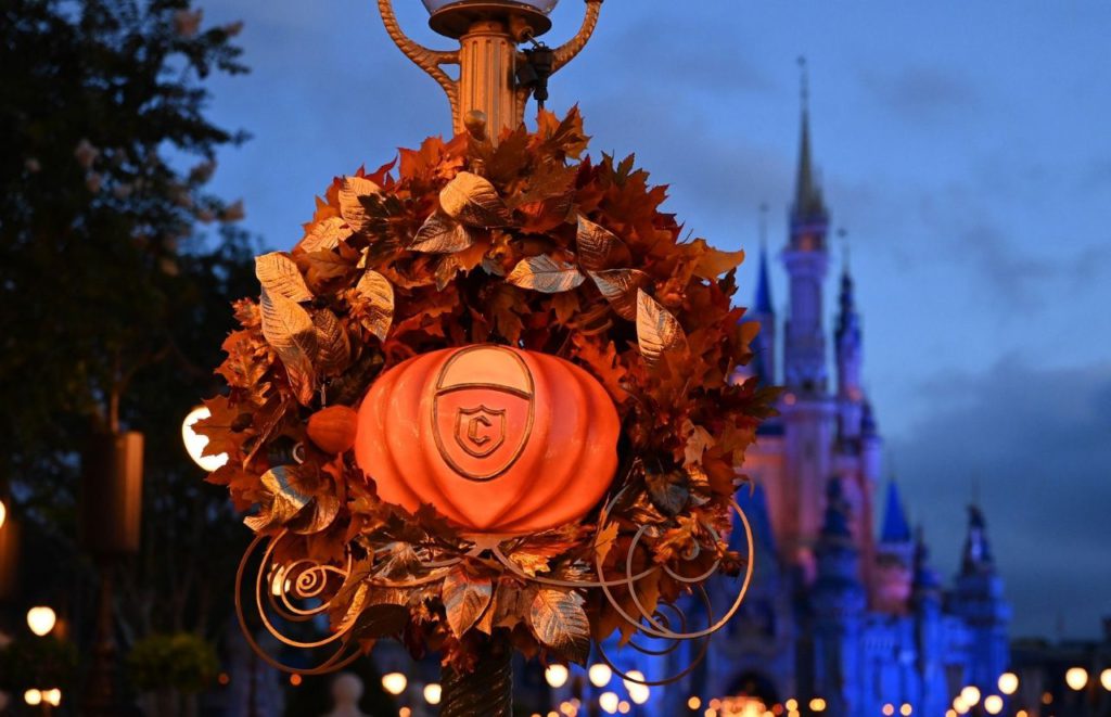 Just as Fairy Godmother turned a pumpkin into Cinderella’s coach with her wand festive fall-themed wreaths on Main Street, U.S.A. Photographer Todd Anderson Disney World 50th Anniversary Celebration.