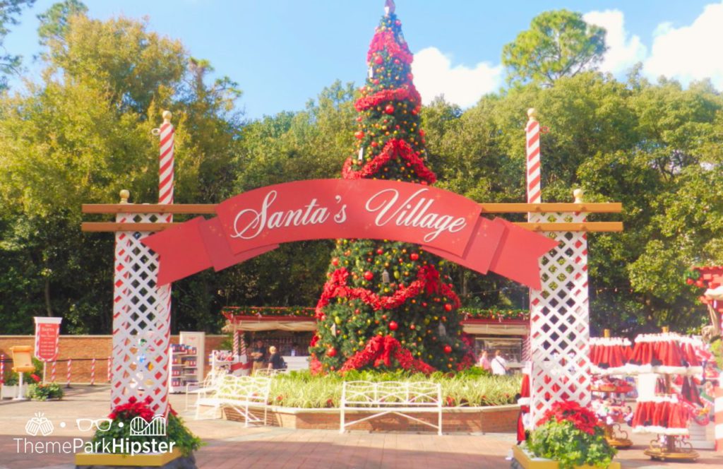 Christmas at Epcot with Christmas Tree in Santa's Village. Keep reading to learn about Epcot International Festival of the Holidays!